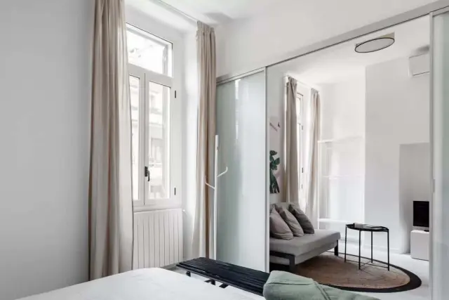 Elegante appartamento minimal dai tocchi botanici 3